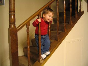 Andrew by himself on the stairs.  I just thought it was a cute picture.