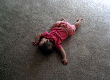 Audrey woke up one morning.  I guess she wasn't done sleeping yet, though, because after I got her up, she fell asleep first on me, and then on the floor.