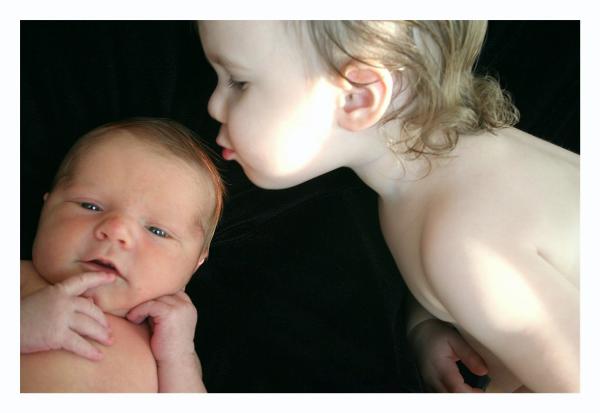 She kicked the curtains, throwing light on her.  Oh well.  They look cute at least!