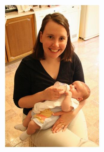 Here's where we digress.  A nice pic of Laura feeding the babe.