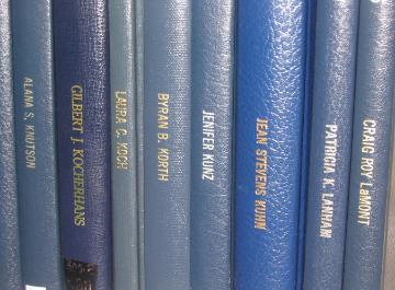 We visited Laura's thesis in the HBLL.  It was actually there, and it had actually been checked out! 