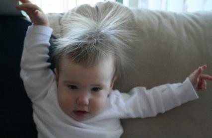 Trying to use a piece of fleece as a backdrop, all we really got was big static hair.