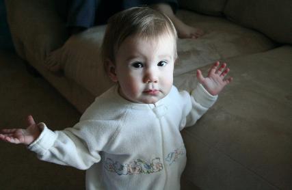 Audrey knows all the signs for 'Popcorn Popping.' Here she's doing 'nice surprise.'