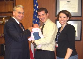 My little diplomat got to meet Amb. Ricciardone.  Audrey's quite famous as the she's the first baby born in our housing compound.