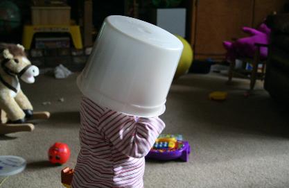 And this was the ice cream bucket.  She couldn't see where she was going, but she liked having it on her head!