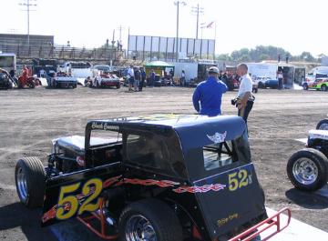 My father-in-law with 52n, his car.