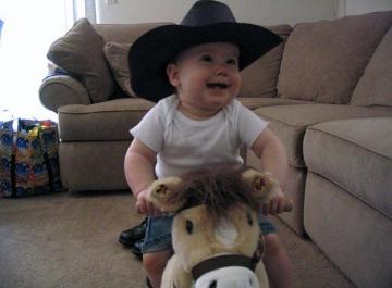 She loved the rocking horse. It sang a little song, and I thought it somewhat depressing that I could sing the entire song at the end of our stay.