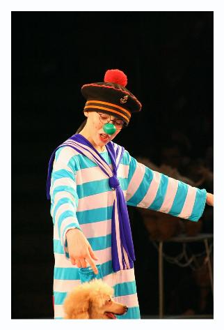 The fourth clown.  He also trained the dogs.  He was also young.  I'd have to wager about 17 or 18.