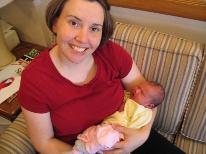 Laura holding the baby.