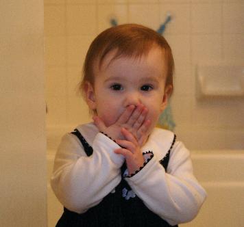 Audrey knows all the signs for 'Popcorn Popping.' Here she's doing 'smells so sweet.'