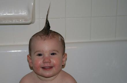 Her hair really is long, but her hair pattern is kind of weird.  The longest parts are right down the middle of her head like a mohawk.