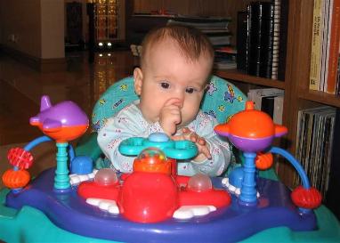 And sucking her thumb.  Especially now that she's teething, we can't get that thing out of her mouth to save her life!