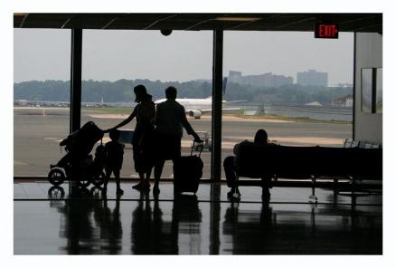 Showing the kids the plane.